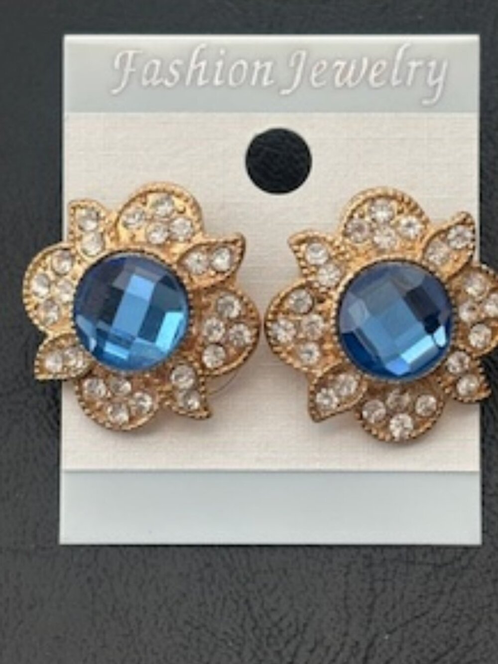 Fashion Earrings-Gold tone base metal-Rhinestones accents-Center blue stone